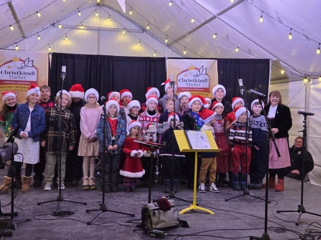 Children's choir performing at the Kitchener Christkindlmarket